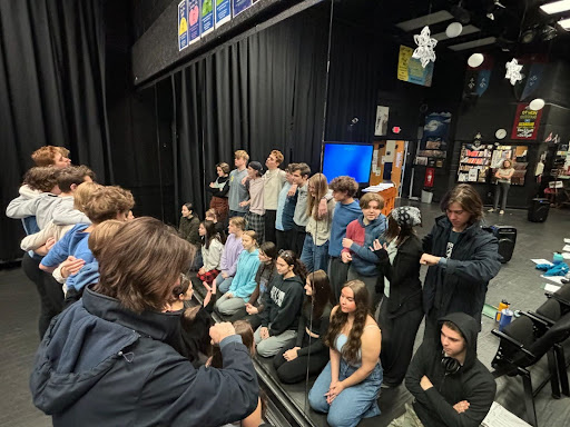 Woodgrove theater students character posing for “Alice by Heart in the mirror of the blackbox theater on January 8th, 2024. Photo taken by Abby Stanton.