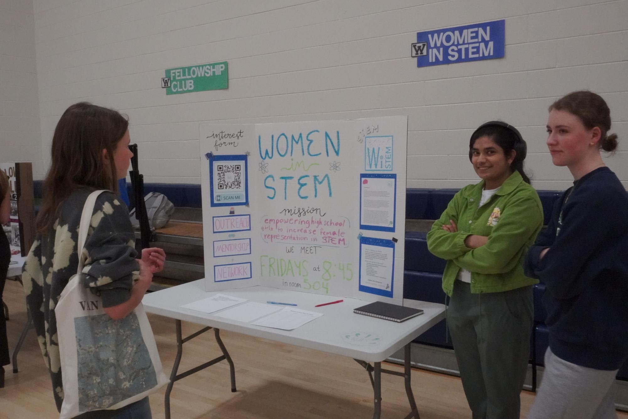 Women in S.T.E.M. presenting to 8th graders about their club at the 8th Grade Expo Day. Photo provided by Augusta Beekman.
