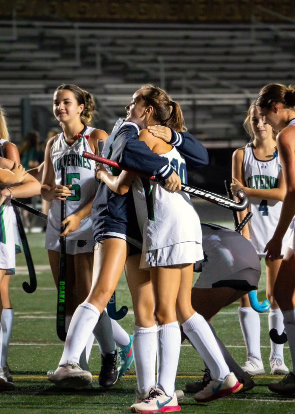 Vivien Wohlfeil and Savannah Brunkow share a moment after a big win against Kettle Run. Photo provided by Plaid Sheep Creative.
