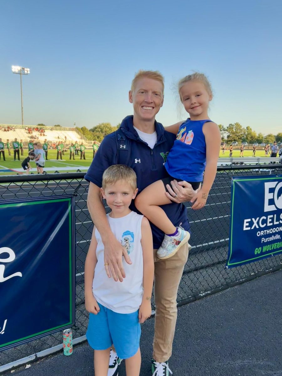 Mr. Gargan at the Woodgrove stadium with his children Reid (left) and Mabel (right). Photo provided by Zachary Gargan.