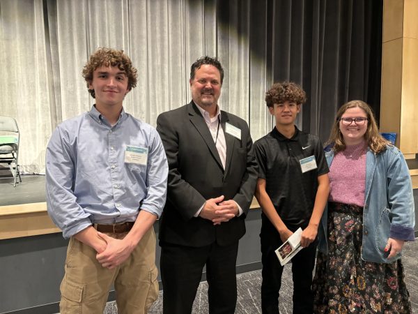 The representatives for Loudoun County at the FACS Forum. From left to
right: Brooks Frandsen, Dr. Spence, DJ Bundick, and Ms. Amber Bartling.
Photo provided by Amber Bartling.