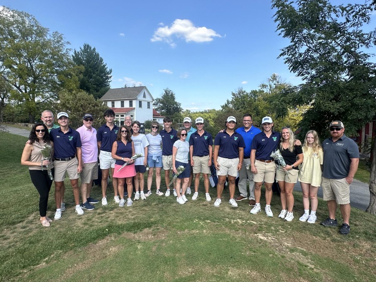 The golf team with their parents before the regional tournament. Photo provided by Vincenzo Cusat. 
