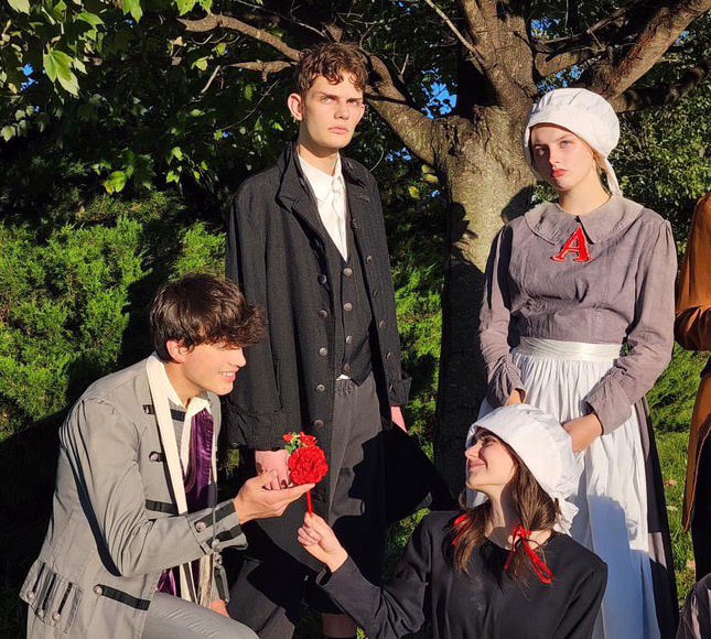 Four members of the Scarlet Letter cast pose for their promotional photoshoot for the play. From left to right, Kristian Holland, Chris Shuffleton, Ella Jaffee, Izzy Jewell. Photo provided by The Grove Theatre.