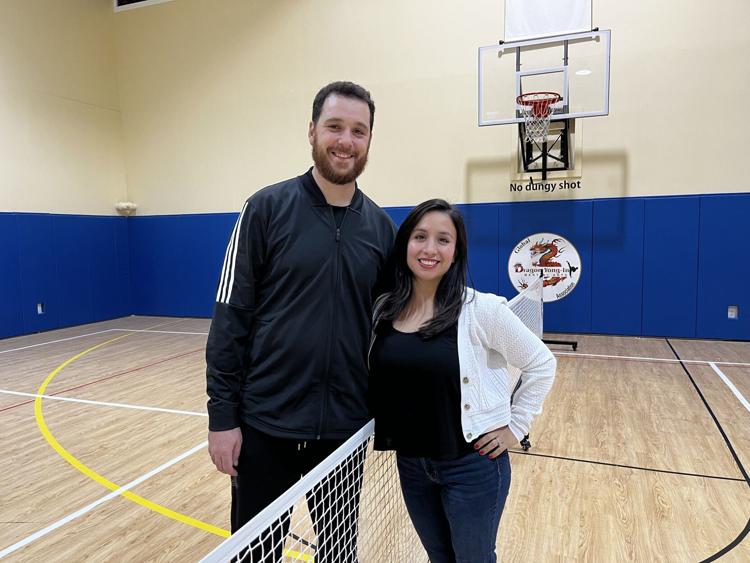 Owners Seán Cogolludo and his wife Claudia Rivera inside their new Purcellville Sportsplex. Photo provided by Karen Graham of Loudoun Times.
