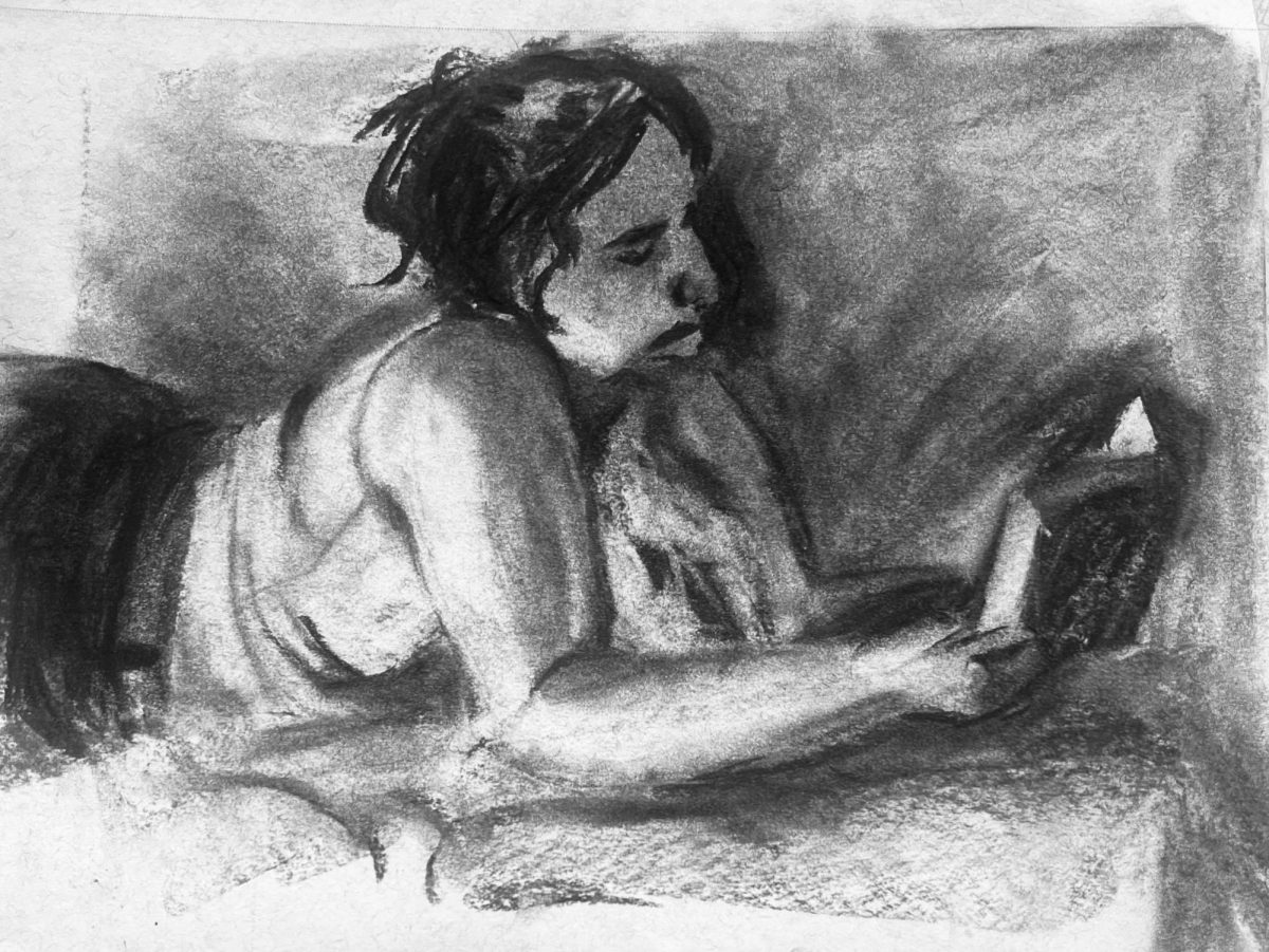 A figure drawing of a live model created with charcoal by Madeline Rogers. Photo provided by Madeline Rogers.