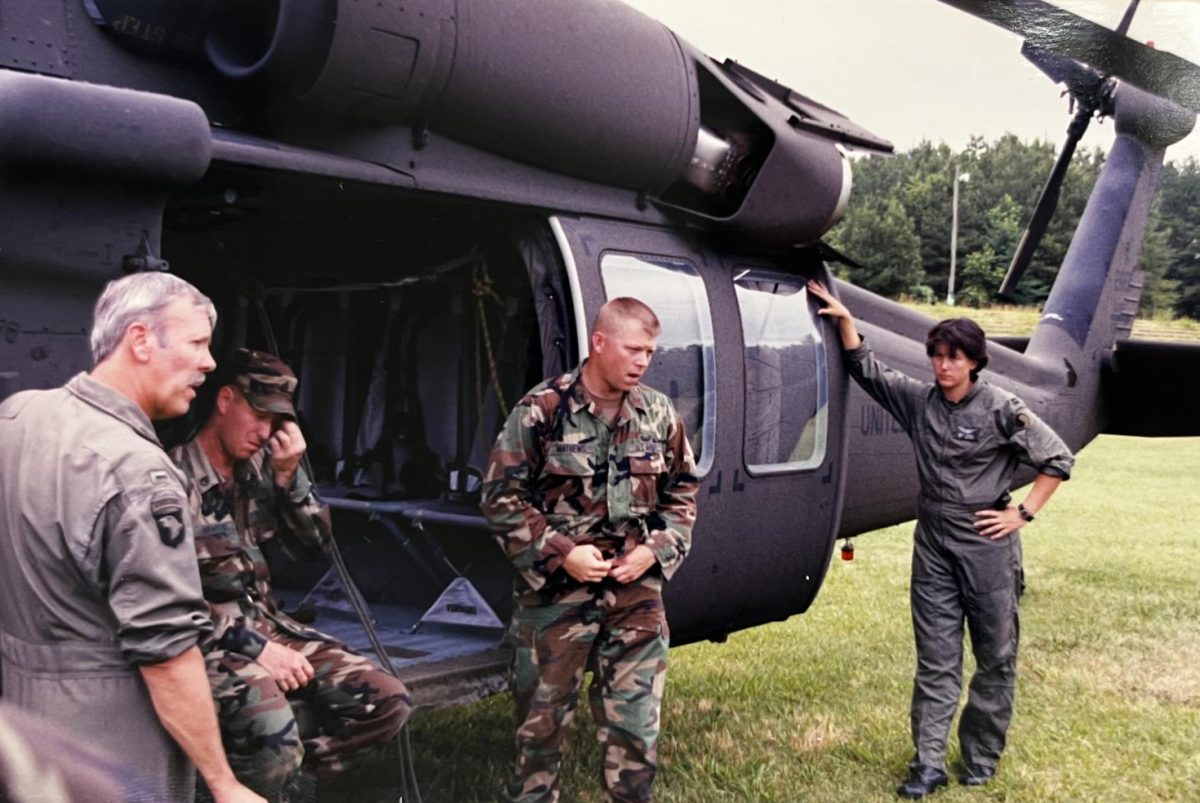 Mathews rigging up a helicopter for a rappel mission in ‘95. Photo provided by Vernon Mathews.
