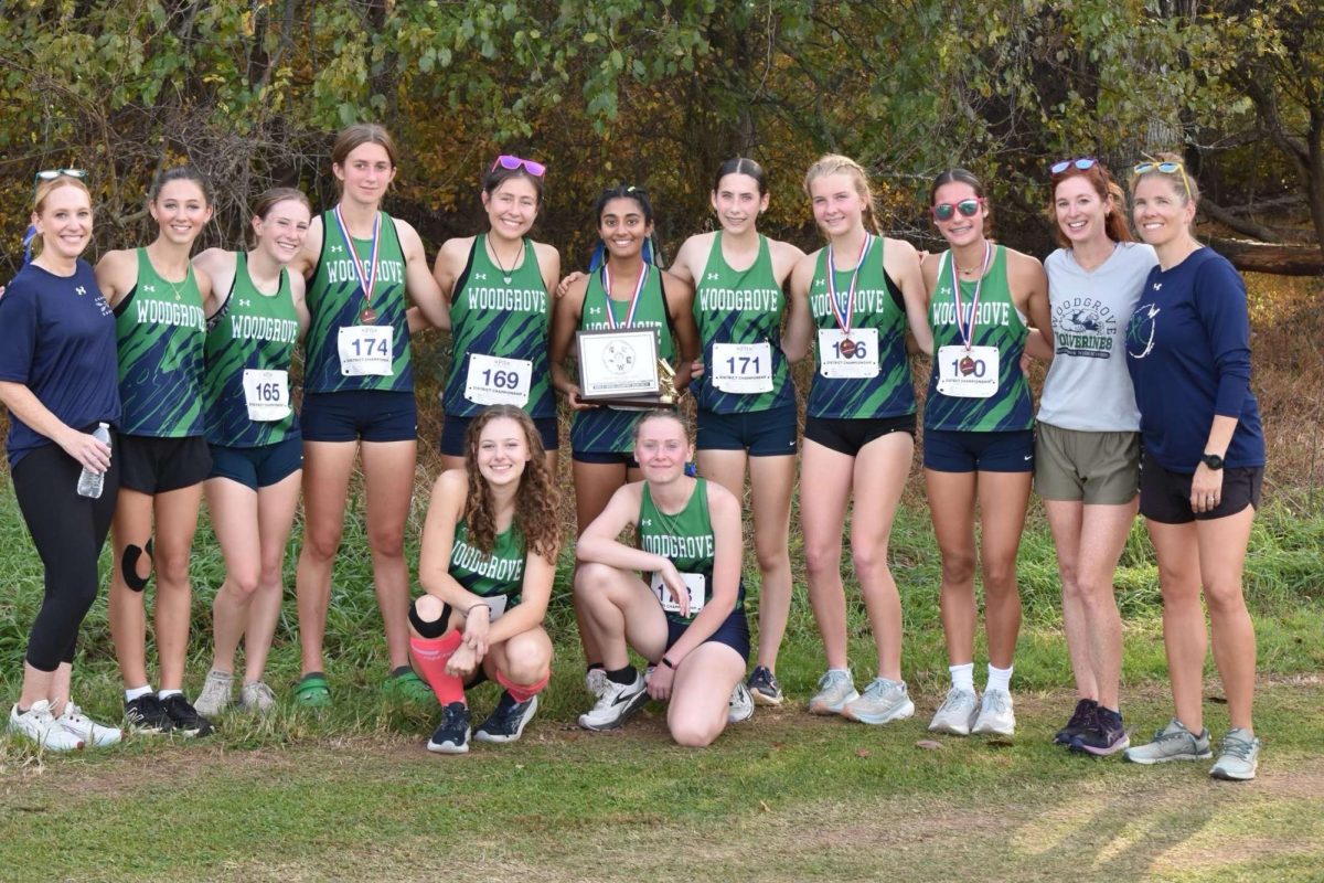 Girls Varsity Cross Country Team celebrating their second district win. Photo provided by Taylor Nishiyama.