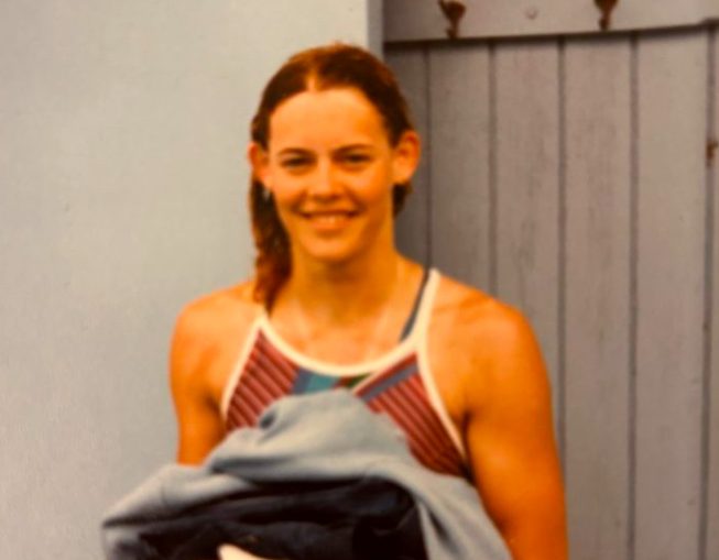 Photo of Tami Carlow after practice at a summer swim camp training for the Junior Nationals in 1984. Photo provided by Tami Carlow. 
