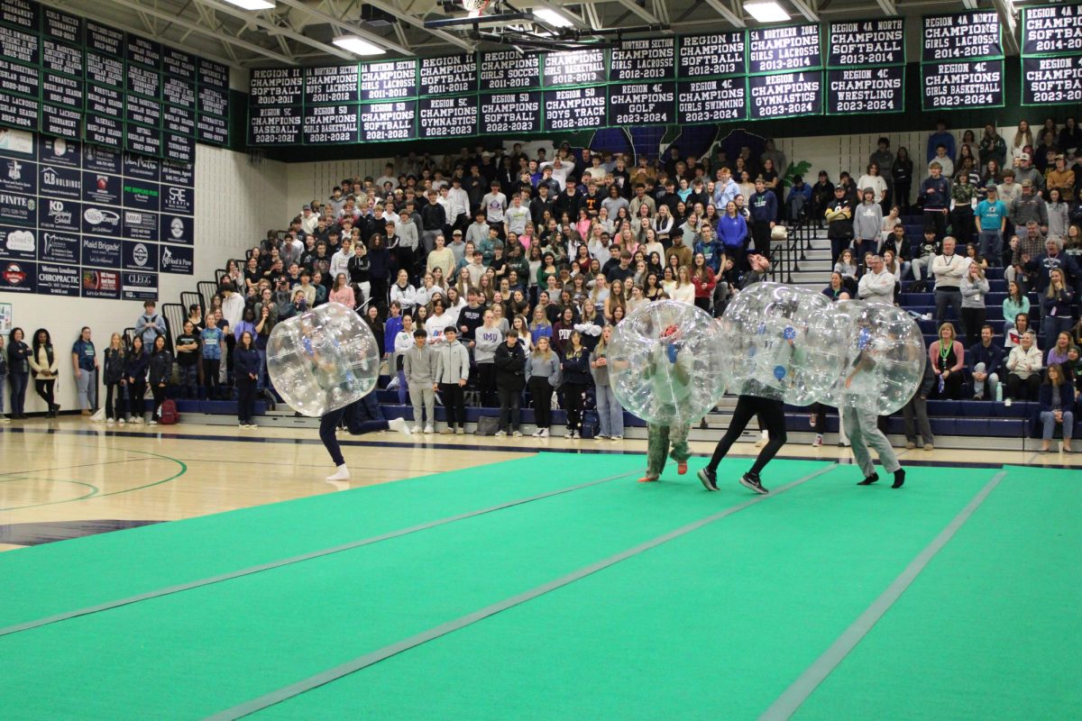 Students participating in the king of the hill game during the winter pep rally. Photo provided by Kenzie Sonak.  
